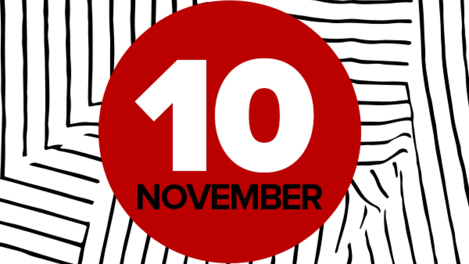 November 10 written on red circle, over black and white background