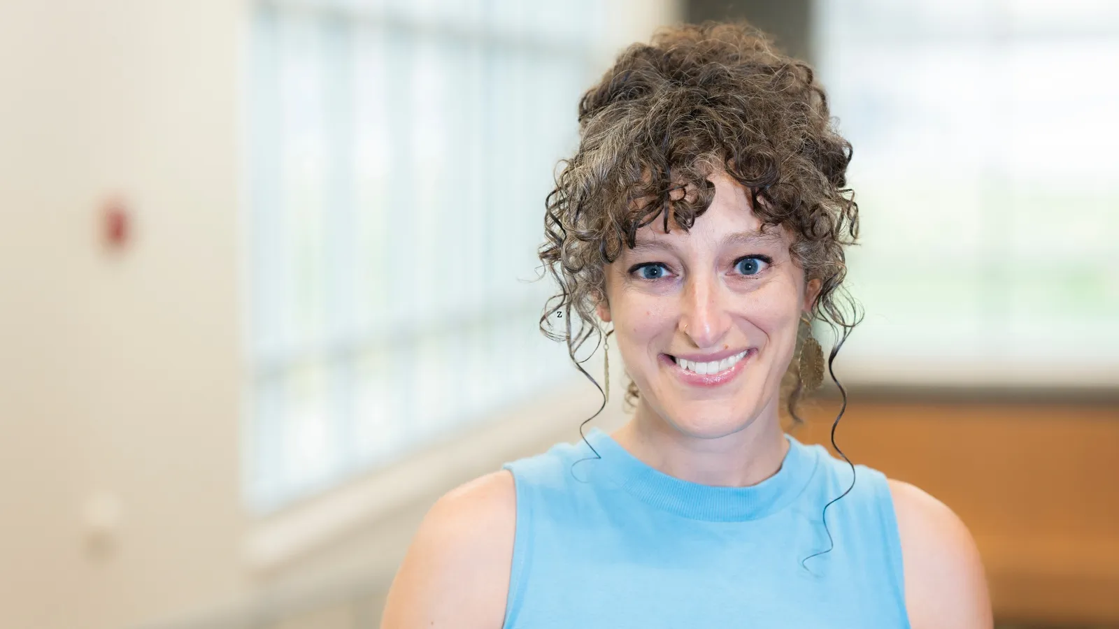 Professional headshot of Erin James