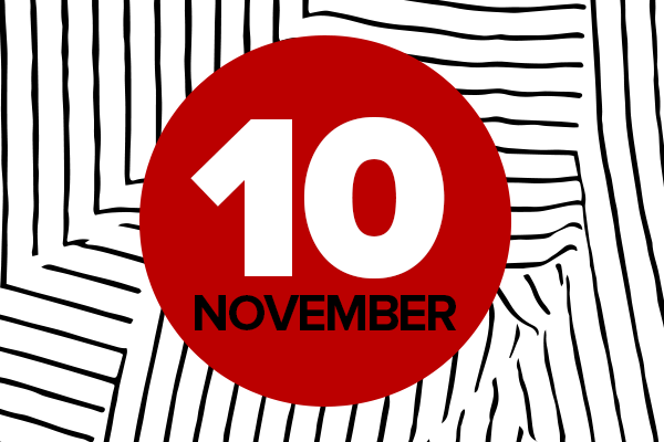 November 10 written on red circle, over black and white background